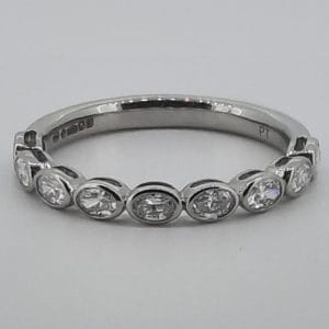 0.50CT Lab grown diamond oval wed band set in Platinum